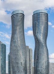 MISSISAUGA, CANADA - NOVEMBER 19, 2015: Absolute World twin tower skyscraper complex close up - view.The complex located in the five tower Absolute City Centre development project in Mississauga , Canada.