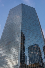 TORONTO, CANADA - AUGUST 24, 2017: Cadillac Fairview Headquarters Building from below with a reflection of Bay Adelaide Centre and KPMG logo at the office complex in the Financial District of Toronto