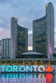 TORONTO, CANADA - JULY 10, 2017: Nathan Phillips Square - Toronto City Hall at sunset